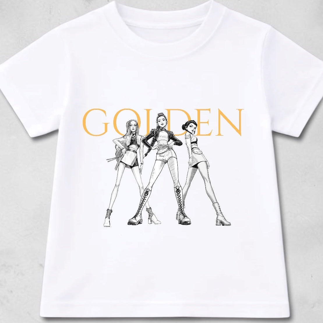 White t-shirt with black and white graphic design and 'GOLDEN' text on a gray background