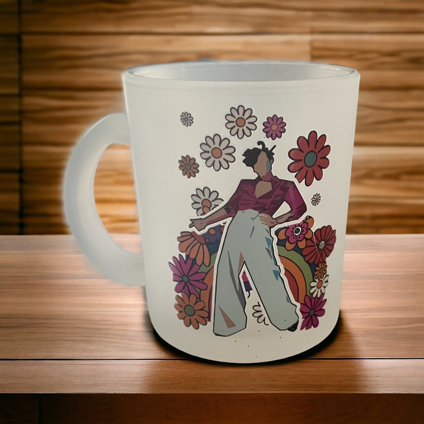 A frosted glass mug with a colorful floral and character design, featuring the text 'Harry'.
