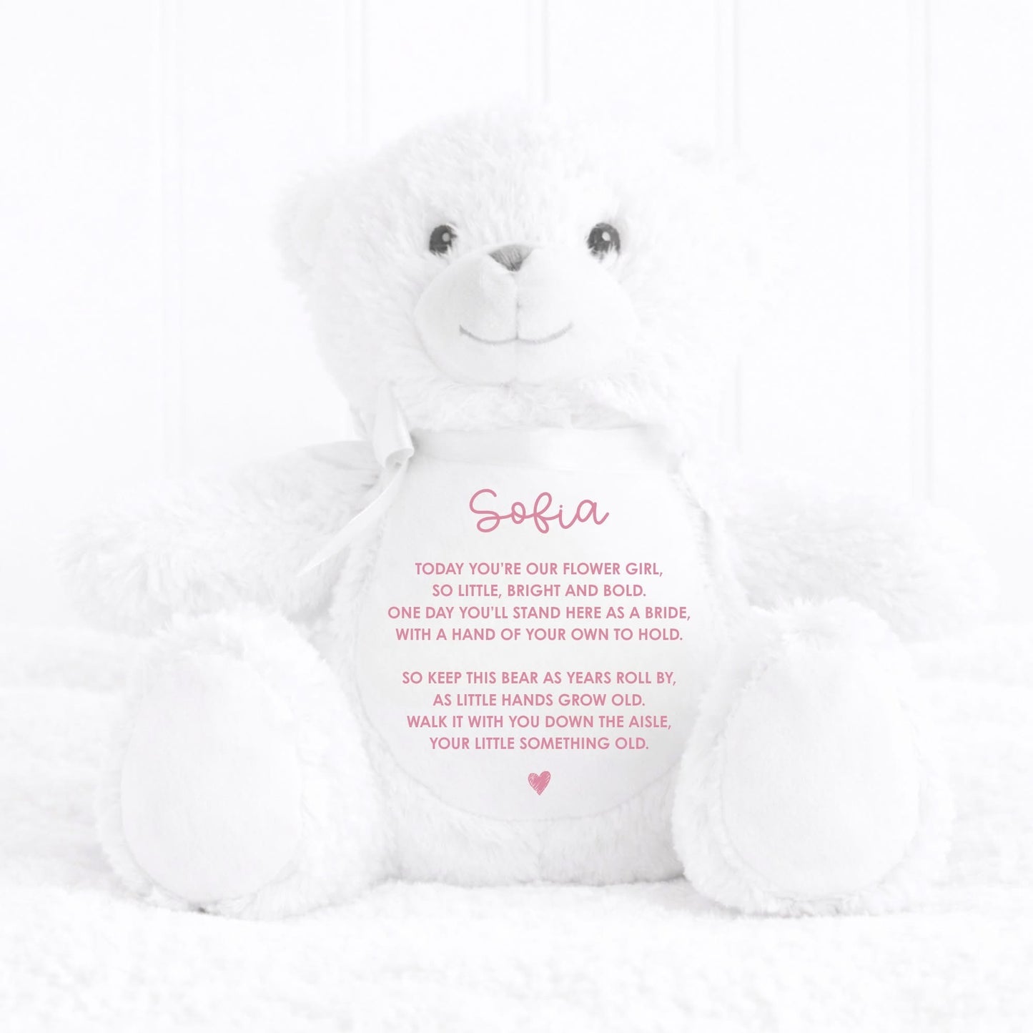 White teddy bear with personalized message on a white background