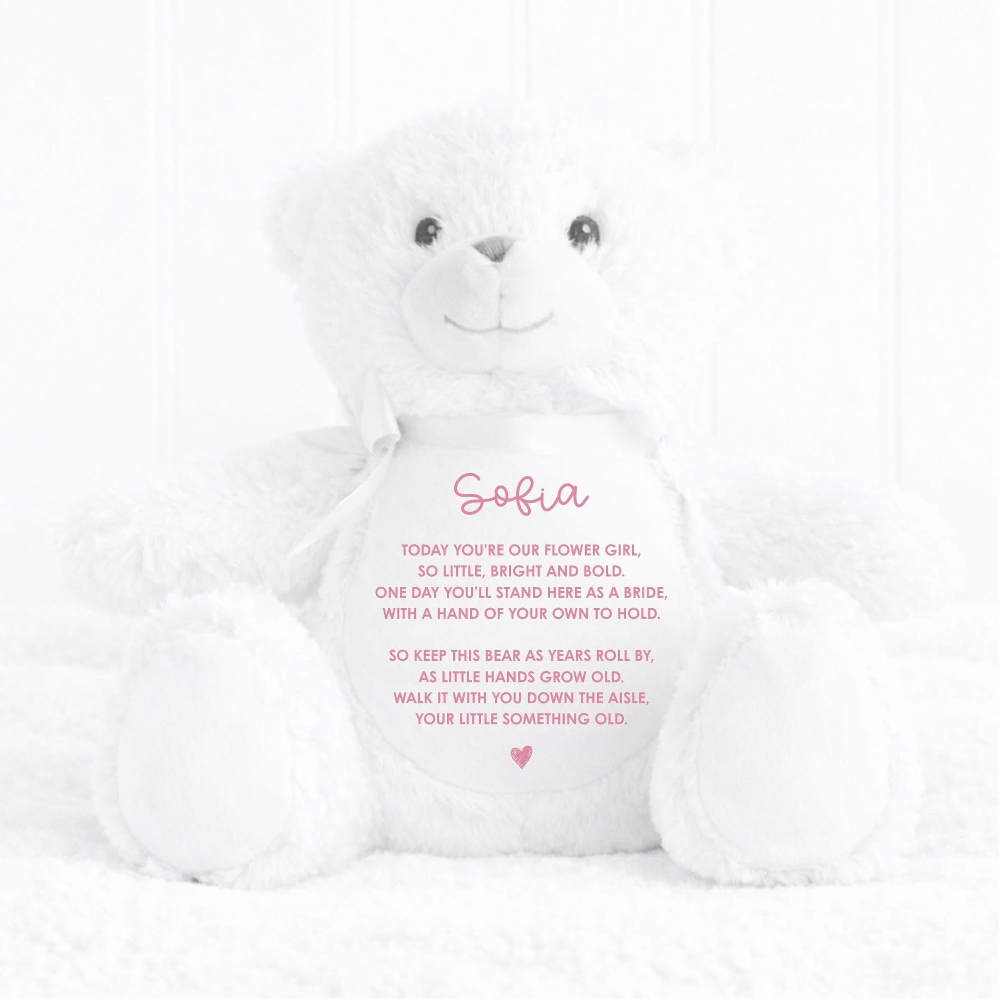 White teddy bear with personalized message on a white background