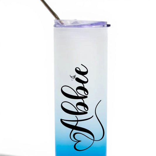 Gradient blue to white tumbler with 'Abbie' text on a white background