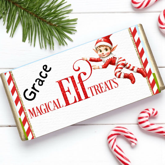 Chocolate bar with 'Elf Treats' design featuring a cartoon elf and personalized name on a festive background.