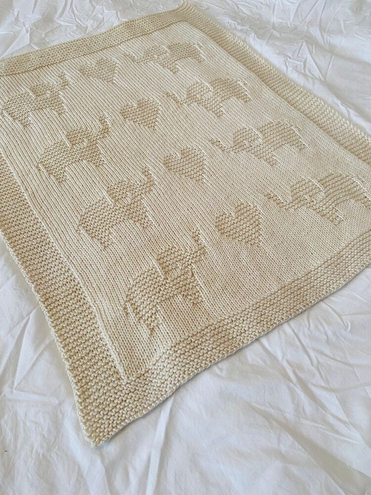 Hand knitted elephant blanket